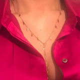 Gold Iris Necklace on neck